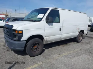 2012 Ford Econoline Cargo Commercial with VIN 1FTNE1EW2CDB17070, listed as a IAAI auction lot 41847884 with 249,165 mi miles and . Bid and sale history available at carsss.com. Image 22.