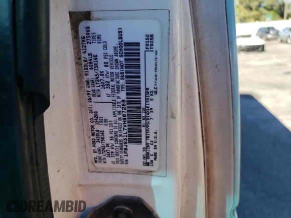 1997 Ford Econoline Wagon XL z VIN 1FBJS31L7VHB87288, wystawiony jako Copart lot #74976854 z przebiegiem 93 368 mil mil oraz Szkody całkowita. Historia ofert i sprzedaży dostępna na DreamBid. Obrazek 13.