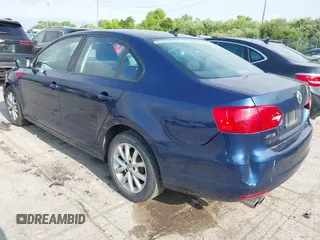 2011 Volkswagen Jetta SE with VIN 3VWDZ7AJ4BM324511, listed as a IAAI auction lot 42355964 with 122,509 mi miles and . Bid and sale history available at DreamBid. Image 3.