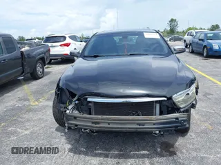 2013 Ford Taurus Limited with VIN 1FAHP2F84DG220283, listed as a IAAI auction lot 40045974 with 155,409 mi miles and . Bid and sale history available at DreamBid. Image 16.