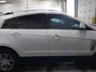 2014 Cadillac SRX Performance Collection with VIN 3GYFNFE36ES615440, listed as a IAAI auction lot 41830849 with 125,128 mi miles and . Bid and sale history available at DreamBid. Image 14.