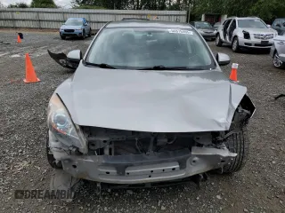 2012 Mazda 3 i Touring with VIN JM1BL1L80C1606906, listed as a Copart auction lot 56876405 with 112,838 mi miles and Salvage Title. Bid and sale history available at DreamBid. Image 5.