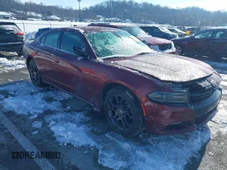 2018 Dodge Charger GT with VIN 2C3CDXJG1JH115648, listed as a IAAI auction lot 41261630 with 101,665 mi miles. Bid and sale history available at carsss.com. Image 1.