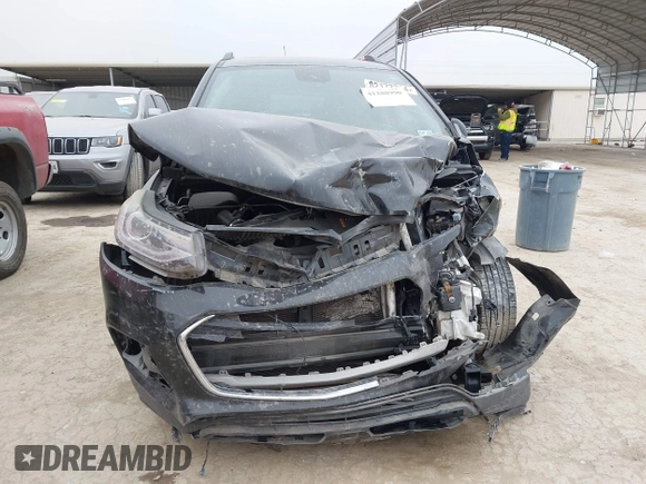 2018 Chevrolet Trax LT with VIN 3GNCJLSBXJL183879, listed as a IAAI auction lot 41288990 with 127,310 mi miles and . Bid and sale history available at DreamBid. Image 12.