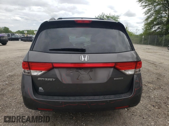 2014 Honda Odyssey Touring with VIN 5FNRL5H90EB014360, listed as a Copart auction lot 56699845 with 180,913 mi miles and Salvage title. Bid and sale history available at DreamBid. Image 6.