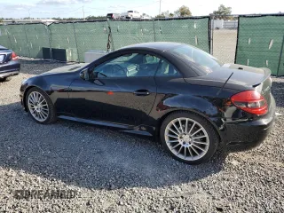 2009 Mercedes-Benz SLK-Class 3.0L with VIN WDBWK54F79F190128, listed as a Copart auction lot 80048934 with 32,354 mi miles and Salvage Title. Bid and sale history available at carsss.com. Image 2.