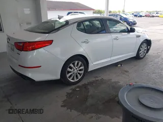 2015 Kia Optima EX z VIN 5XXGN4A72FG350868, wystawiony jako IAAI lot #42242887 z przebiegiem 222 208 mil mil oraz . Historia ofert i sprzedaży dostępna na DreamBid. Obrazek 4.