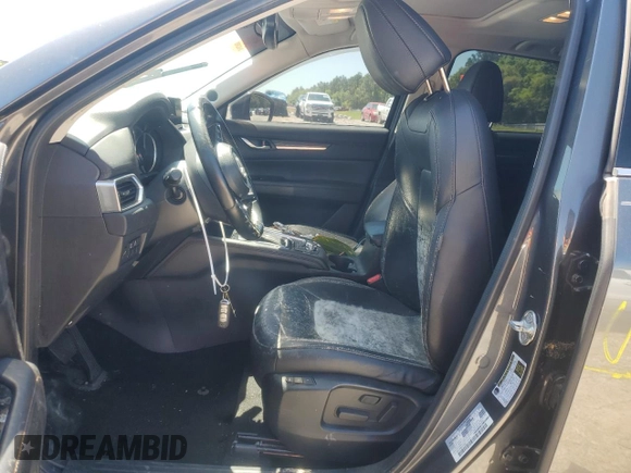 2018 Mazda CX-5 Grand Touring with VIN JM3KFADM9J0343621, listed as a Copart auction lot 52284475 with 129,776 mi miles and Salvage Title. Bid and sale history available at DreamBid. Image 7.
