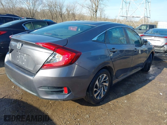 2016 Honda Civic EX with VIN 19XFC2F74GE014325, listed as a IAAI auction lot 41188650 with 117,040 mi miles and . Bid and sale history available at DreamBid. Image 4.
