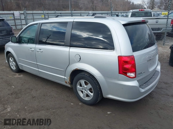 2011 Dodge Grand Caravan Crew with VIN 2D4RN5DG0BR751611, listed as a IAAI auction lot 41683889 with 181,551 mi miles and . Bid and sale history available at DreamBid. Image 3.