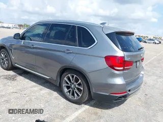 2016 BMW X5 xDrive40e with VIN 5UXKT0C58G0S75938, listed as a IAAI auction lot 42021138 with 97,426 mi miles and . Bid and sale history available at DreamBid. Image 3.