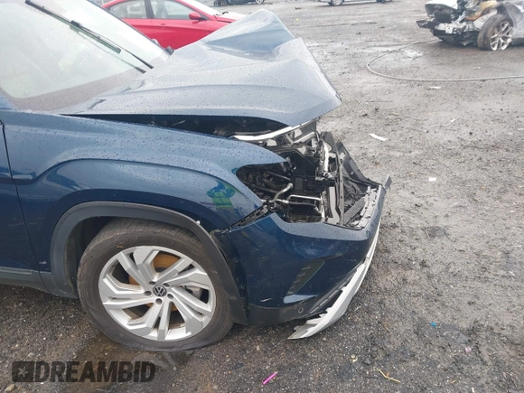 2022 Volkswagen Atlas SE with VIN 1V2HR2CA0NC561411, listed as a IAAI auction lot 41941719 with Not provided miles and . Bid and sale history available at DreamBid. Image 18.