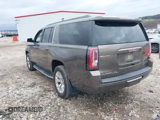 2015 GMC Yukon XL SLT with VIN 1GKS2HKC6FR582574, listed as a IAAI auction lot 41187550 with 185,737 mi miles. Bid and sale history available at carsss.com. Image 3.