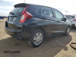 2017 Honda Fit LX with VIN 3HGGK5H58HM711154, listed as a Copart auction lot 52015615 with 113,055 mi miles and Salvage Title. Bid and sale history available at carsss.com. Image 3.