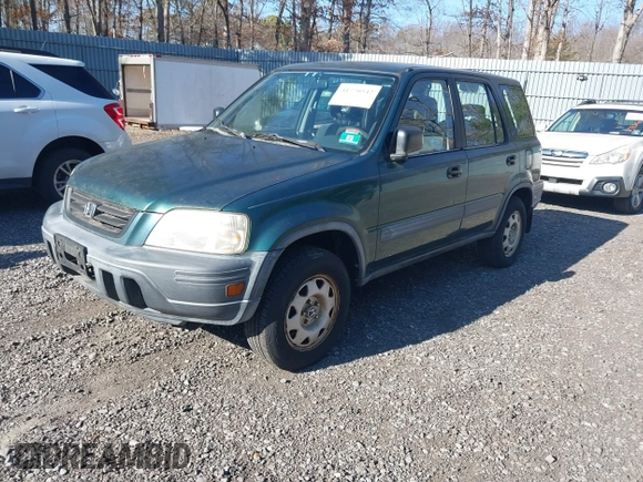 2001 Honda CR-V LX with VIN JHLRD18431C016561, listed as a IAAI auction lot 41770542 with 135,447 mi miles. Bid and sale history available at carsss.com. Image 2.