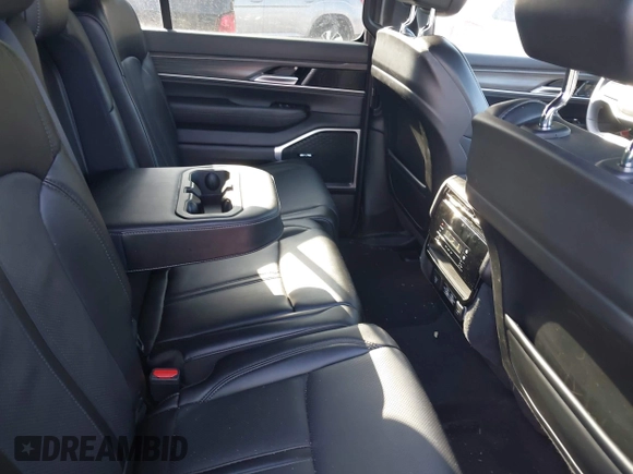 2024 Jeep Wagoneer Series II with VIN 1C4SJUBP0RS165085, listed as a IAAI auction lot 41990116 with 29,683 mi miles and . Bid and sale history available at DreamBid. Image 8.