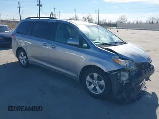 2013 Toyota Sienna LE AAS with VIN 5TDKK3DC1DS363984, listed as a IAAI auction lot 41346106 with 112,446 mi miles. Bid and sale history available at carsss.com. Image 1.