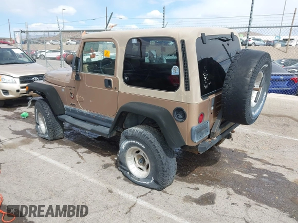 1999 Jeep Wrangler Sahara with VIN 1J4FY49S6XP437964, listed as a IAAI auction lot 41947995 with 118,566 mi miles. Bid and sale history available at carsss.com. Image 3.