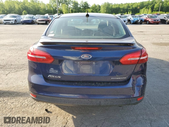 2017 Ford Focus Titanium with VIN 1FADP3J2XHL203959, listed as a Copart auction lot 55498465 with 68,154 mi miles and Salvage title. Bid and sale history available at DreamBid. Image 6.