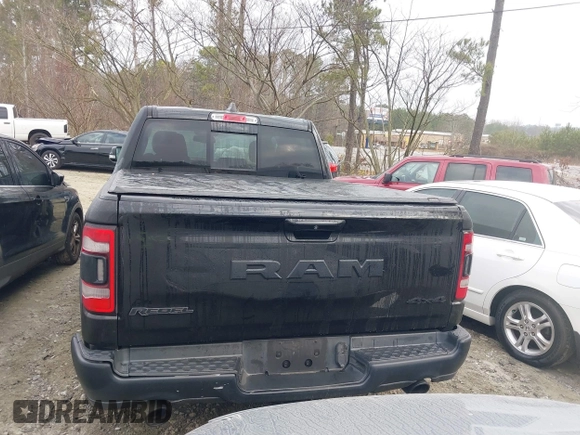 2019 Ram 1500 Rebel with VIN 1C6SRFLTXKN580782, listed as a IAAI auction lot 41498027 with 83,669 mi miles and . Bid and sale history available at DreamBid. Image 15.