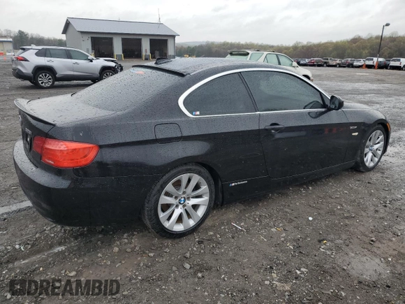2012 BMW 3 Series 328i with VIN WBAKE5C59CJ106098, listed as a Copart auction lot 51977925 with 136,275 mi miles and Salvage title. Bid and sale history available at DreamBid. Image 3.