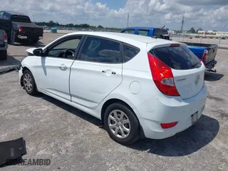 2013 Hyundai Accent GL with VIN KMHCT5AE1DU092600, listed as a IAAI auction lot 41901615 with 126,327 mi miles. Bid and sale history available at carsss.com. Image 3.