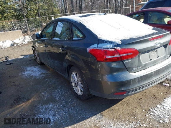 2015 Ford Focus SE with VIN 1FADP3F24FL276766, listed as a IAAI auction lot 41388348 with 59,579 mi miles. Bid and sale history available at carsss.com. Image 3.