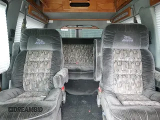 2000 Ford Econoline Cargo Recreational z VIN 1FDRE14L3YHA17676, wystawiony jako Copart lot #58571465 z przebiegiem 174 129 mil mil oraz Szkoda całkowita • Salvage title. Historia ofert i sprzedaży dostępna na DreamBid. Obrazek 10.