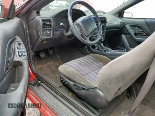 2002 Chevrolet Camaro z VIN 2G1FP22K322135404, wystawiony jako Copart lot #58767305 z przebiegiem Nie podano mil oraz Czysty tytuł • Clean title. Historia ofert i sprzedaży dostępna na DreamBid. Obrazek 8.