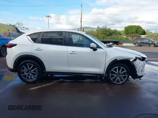 2018 Mazda CX-5 Touring with VIN JM3KFACM1J1431462, listed as a IAAI auction lot 41038099 with 77,489 mi miles. Bid and sale history available at carsss.com. Image 13.