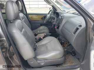 2005 Ford Escape Hybrid with VIN 1FMCU95H55KC07544, listed as a IAAI auction lot 42104756 with 250,109 mi miles. Bid and sale history available at carsss.com. Image 5.