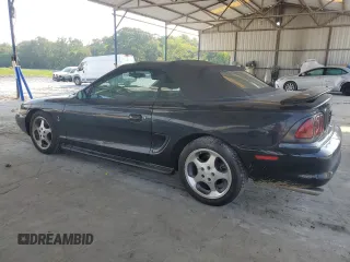 1996 Ford Mustang Cobra with VIN 1FALP46V0TF188786, listed as a Copart auction lot 57933355 with 36,931 mi miles and Salvage title. Bid and sale history available at DreamBid. Image 2.