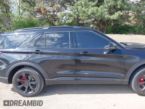 2023 Ford Explorer ST z VIN 1FM5K8GC7PGA12321, wystawiony jako IAAI lot #42125721 z przebiegiem 27 856 mil mil oraz . Historia ofert i sprzedaży dostępna na DreamBid. Obrazek 13.