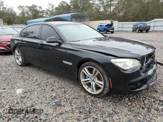 2013 BMW 7 Series 750Li z VIN WBAYE8C53DD131817, wystawiony jako Copart lot #79615564 z przebiegiem 125 737 mil mil oraz Szkoda całkowita • Salvage title. Historia ofert i sprzedaży dostępna na DreamBid. Obrazek 4.
