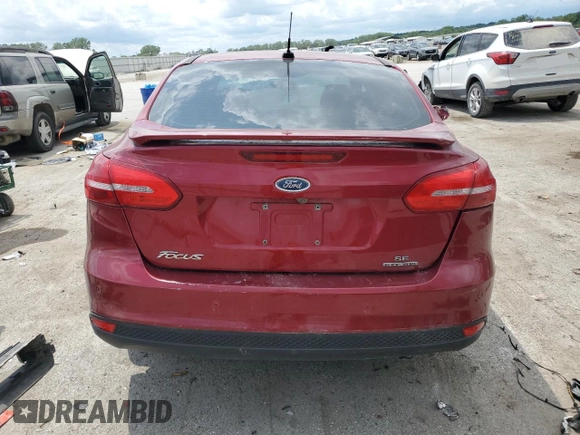 2015 Ford Focus SE with VIN 1FADP3F22FL368703, listed as a Copart auction lot 61609235 with 147,269 mi miles and Salvage title. Bid and sale history available at DreamBid. Image 6.