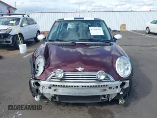 2003 MINI Hardtop with VIN WMWRC33493TC45557, listed as a IAAI auction lot 41868476 with 114,848 mi miles and . Bid and sale history available at DreamBid. Image 13.