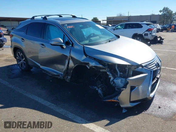 2018 Lexus RX 350 z VIN 2T2BZMCA7JC140852, wystawiony jako IAAI lot #41669823 z przebiegiem 56 306 mil mil oraz . Historia ofert i sprzedaży dostępna na DreamBid. Obrazek 1.