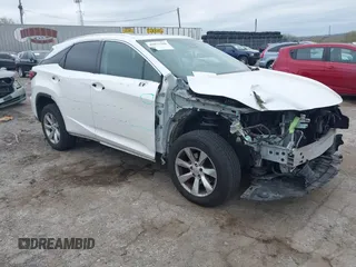 2016 Lexus RX 350 z VIN 2T2BZMCAXGC014817, wystawiony jako IAAI lot #42077588 z przebiegiem 91 035 mil mil oraz . Historia ofert i sprzedaży dostępna na DreamBid. Obrazek 1.