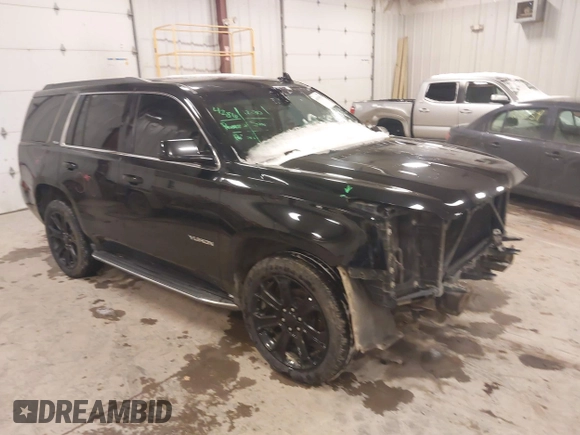 2016 GMC Yukon SLE with VIN 1GKS2AKC1GR276262, listed as a IAAI auction lot 41336378 with 213,182 mi miles. Bid and sale history available at carsss.com. Image 1.