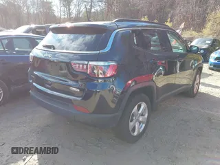 2019 Jeep Compass Latitude with VIN 3C4NJDBB6KT593734, listed as a IAAI auction lot 40871646 with 84,197 mi miles and . Bid and sale history available at DreamBid. Image 4.