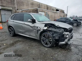 2016 BMW X5 M with VIN 5YMKT6C56G0R77641, listed as a Copart auction lot 43276205 with 86,910 mi miles and Salvage Title. Bid and sale history available at carsss.com. Image 4.