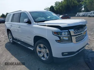 2017 Chevrolet Tahoe LT with VIN 1GNSKBKC2HR279617, listed as a IAAI auction lot 42614518 with 111,488 mi miles and . Bid and sale history available at DreamBid. Image 1.