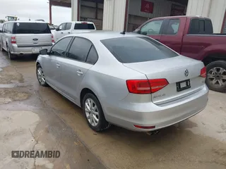 2015 Volkswagen Jetta Sedan 1.8T SE with VIN 3VWD17AJ8FM336528, listed as a IAAI auction lot 42013023 with 89,972 mi miles. Bid and sale history available at carsss.com. Image 3.