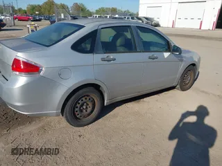 2009 Ford Focus S with VIN 1FAHP34N79W221813, listed as a IAAI auction lot 41758471 with 248,531 mi miles. Bid and sale history available at carsss.com. Image 4.