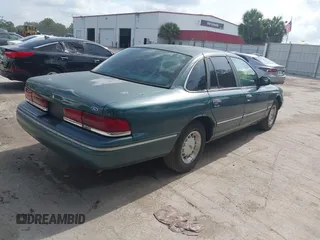 1995 Ford Crown Victoria LX с VIN 2FALP74W9SX120258, выставлен на аукционе IAAI как лот 42414057 с пробегом 210 215 миль миль и . История ставок и продаж доступна на DreamBid. Изображение 4.