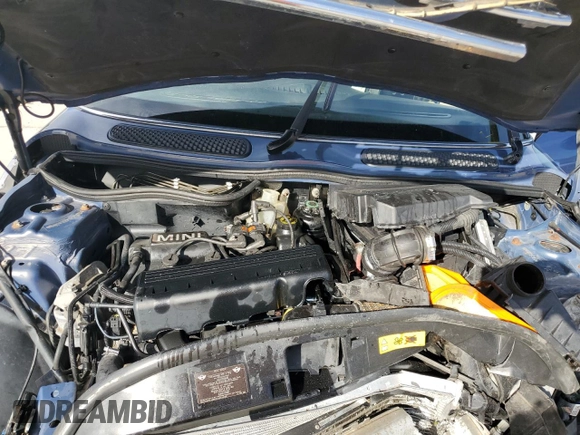 2005 MINI Convertible with VIN WMWRF33555TF62593, listed as a Copart auction lot 48305985 with 172,839 mi miles and Salvage title. Bid and sale history available at DreamBid. Image 12.