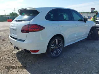 2013 Porsche Cayenne GTS with VIN WP1AD2A25DLA77759, listed as a IAAI auction lot 42316241 with 212,034 mi miles and . Bid and sale history available at DreamBid. Image 4.