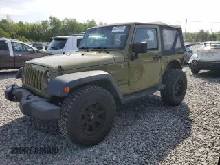 2013 Jeep Wrangler Sport z VIN 1C4AJWAG1DL632168, wystawiony jako Copart lot #64757575 z przebiegiem 148 316 mil mil oraz Czysty tytuł • Clean title. Historia ofert i sprzedaży dostępna na DreamBid. Obrazek 1.