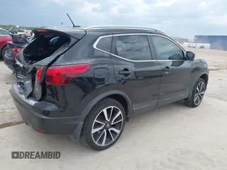2017 Nissan Rogue SV with VIN JN1BJ1CP8HW028998, listed as a IAAI auction lot 42224825 with 96,213 mi miles and . Bid and sale history available at DreamBid. Image 4.