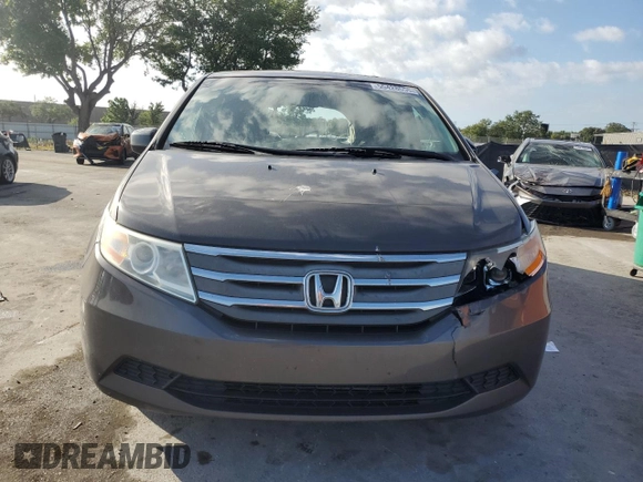 2012 Honda Odyssey EX-L with VIN 5FNRL5H66CB146350, listed as a Copart auction lot 55428555 with 171,207 mi miles and Salvage Title. Bid and sale history available at DreamBid. Image 5.
